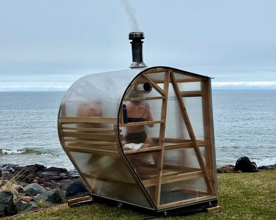 NorthUp Curve sauna installed lakeside with sweeping views of Lake Superior.