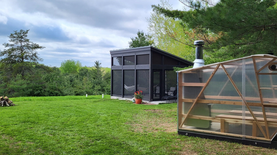 NorthUp XL parked on grassy area in front of a 4-season patio structure. 