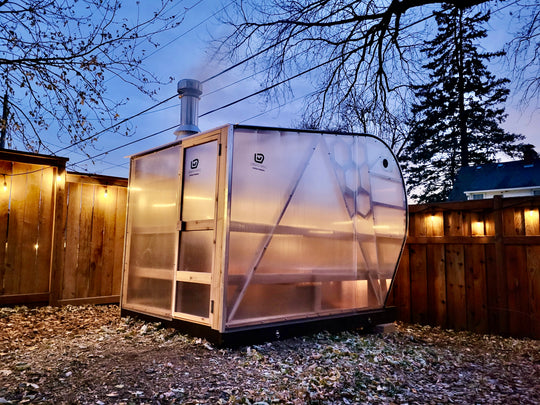 Exterior view of NorthUp Curve XL illuminated at dusk.